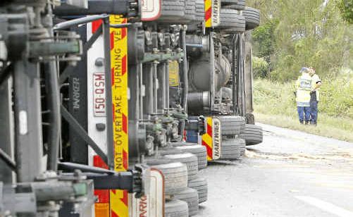 Emergency crews at the scene of the smash on the Pacific Highway south of Ballina. Emergency crews at the scene of the smash on the Pacific Highway south of Ballina.